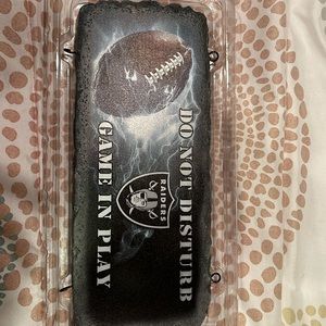 Raiders do not disturb sign